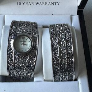 Kessaris Womens Silver Tone Filigree Cuff Watch and Matching Bangle Bracelet Set